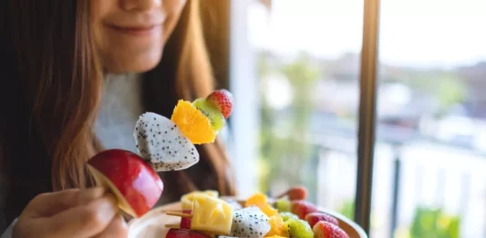 Fresh fruits in an appealing display illustrate heart-healthy choices for lowering blood pressure levels.