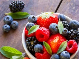 Assorted fresh fruits represent eye-boosting nutrients.