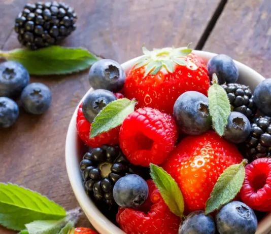 Assorted fresh fruits represent eye-boosting nutrients.