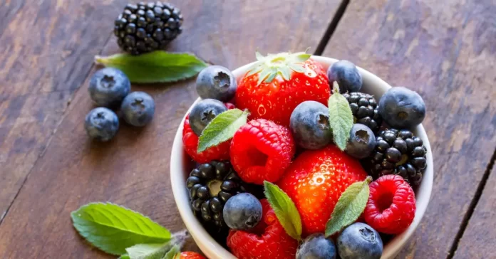 Assorted fresh fruits represent eye-boosting nutrients.