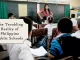 A crowded classroom with attentive students in a Philippine public school showcasing the challenges faced in educational settings.