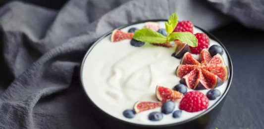 An enticing image illustrates the transformative power of yogurt for health, inviting you into the world of well-being with each spoonful.
