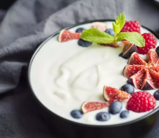 An enticing image illustrates the transformative power of yogurt for health, inviting you into the world of well-being with each spoonful.