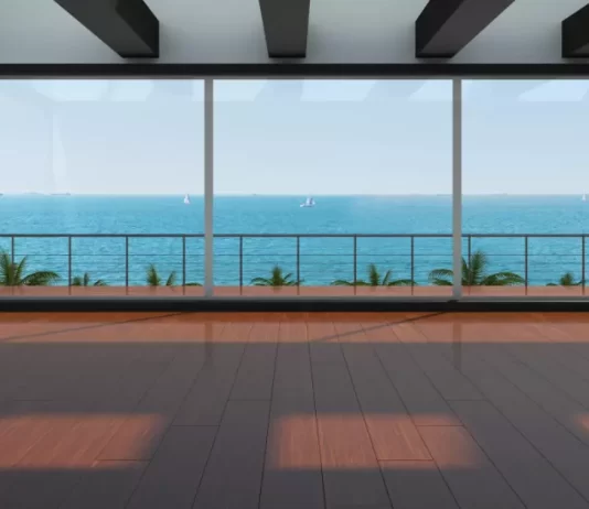 Capture the essence of health benefits associated with coastal living in a picturesque scene featuring waves against the coastal backdrop.