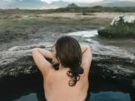 Picture someone immersed in a cold water bath—it represents how refreshing and revitalizing cold water can be for your well-being.