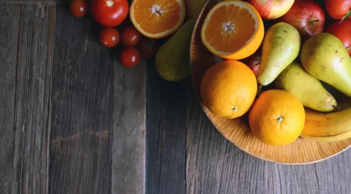 See the vibrant world of fruits—blueberries, carrots, oranges, strawberries, papaya, kiwi, and avocado—all representing the top 7 fruits that enhance and restore vision.