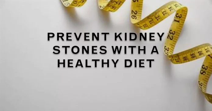 A varied assortment of fruits, vegetables, and glasses of water signifies a diet that promotes kidney health, aiming to prevent the formation of kidney stones.