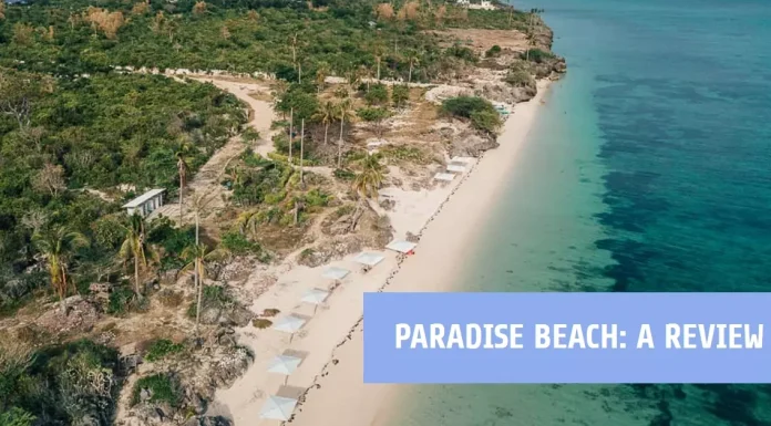 Secluded beach with clear blue waters at Paradise Beach