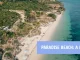 Secluded beach with clear blue waters at Paradise Beach