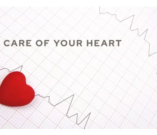 An illustration features a heart surrounded by symbols representing warning signs, risk factors, and healthy lifestyle choices for optimal heart health.