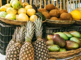 A vibrant assortment of Filipino fruits on display at a lively market stall