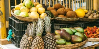 A vibrant assortment of Filipino fruits on display at a lively market stall