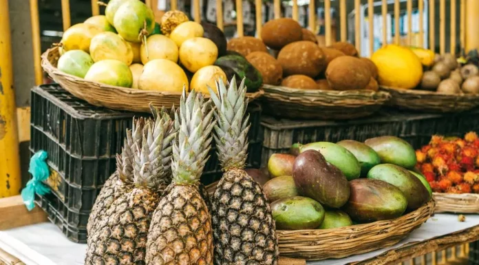 A vibrant assortment of Filipino fruits on display at a lively market stall