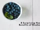 A vibrant assortment of fresh blueberries symbolizes their role in promoting brain health and protecting against neurodegenerative diseases.