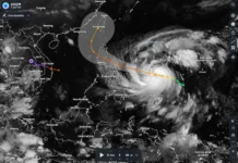 Top 10 Devastating Typhoons in the Philippines Typhoon Yolanda aftermath showing destroyed houses and survivors in Tacloban City.