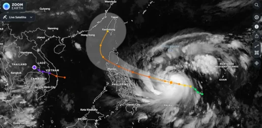 Typhoon Yolanda aftermath showing destroyed houses and survivors in Tacloban City.