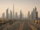 The Dubai skyline highlights skyscrapers, traffic congestion, and urban development challenges.