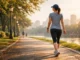 A person walking outdoors for physical and mental wellness.