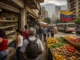 Urban scene in Venezuela showing economic hardship, public services, and everyday life