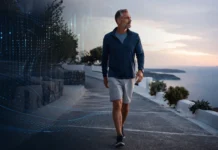 Person walking in a modern outdoor setting, symbolizing vitality, focus, and the life-changing benefits of a daily 20-minute walk.